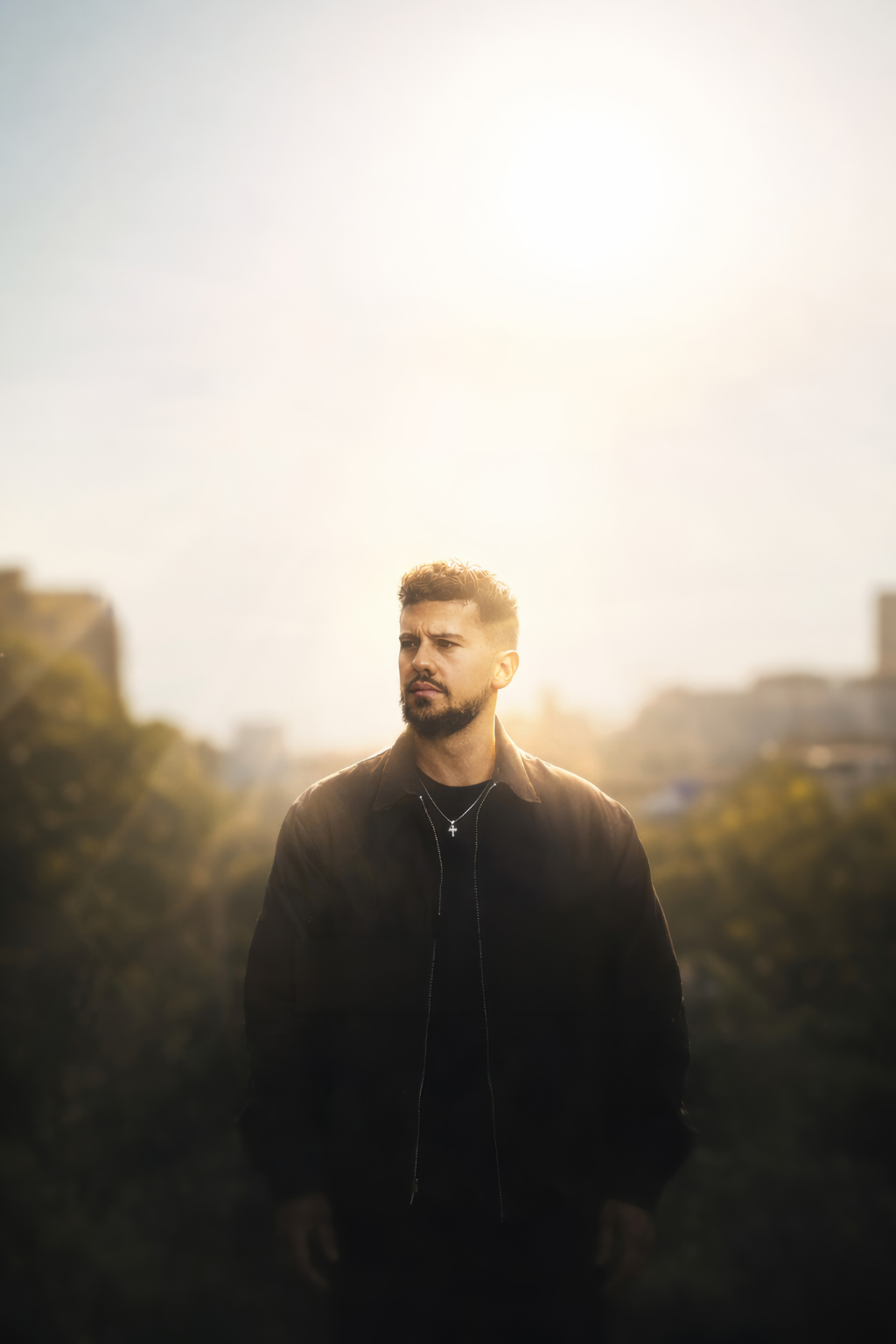 Ruslan outdoors in warm sunlight